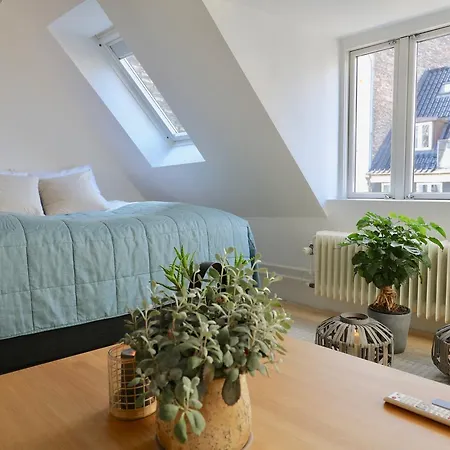 Two-story By Nyhavn Harbour